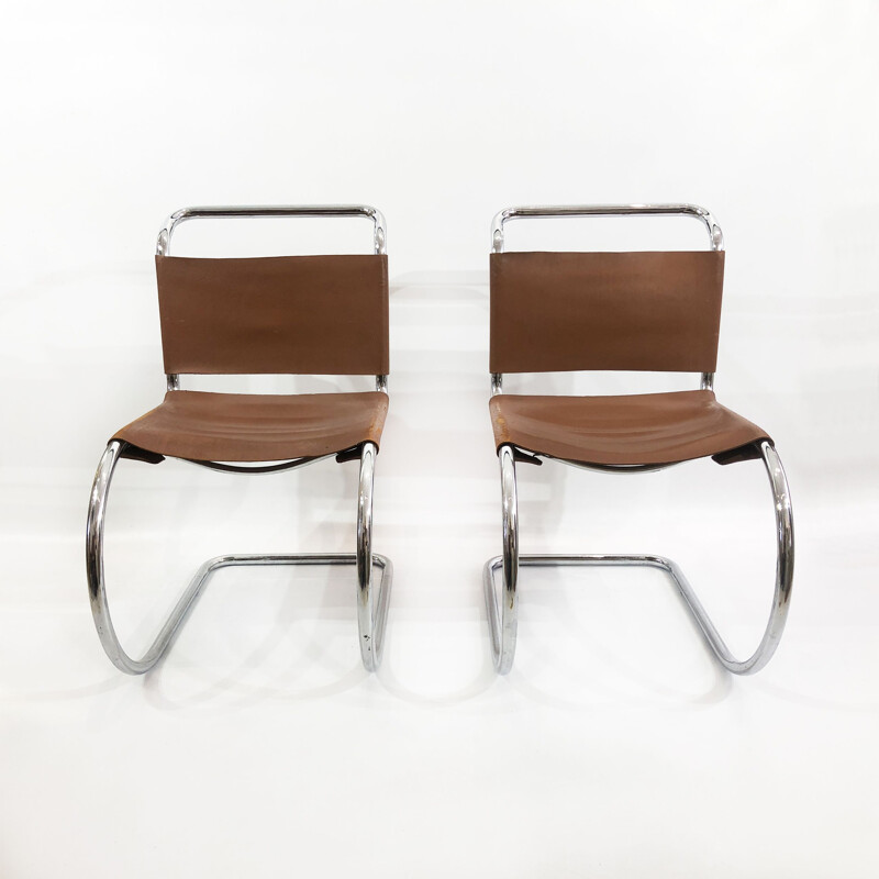 Pair of vintage leather chairs 1920s