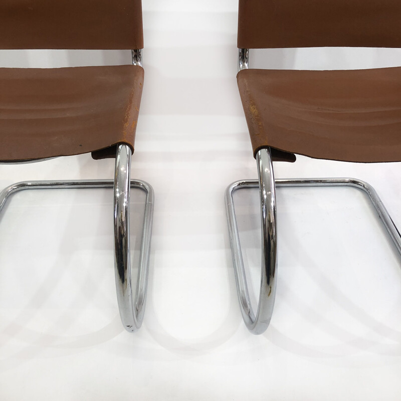 Pair of vintage leather chairs 1920s