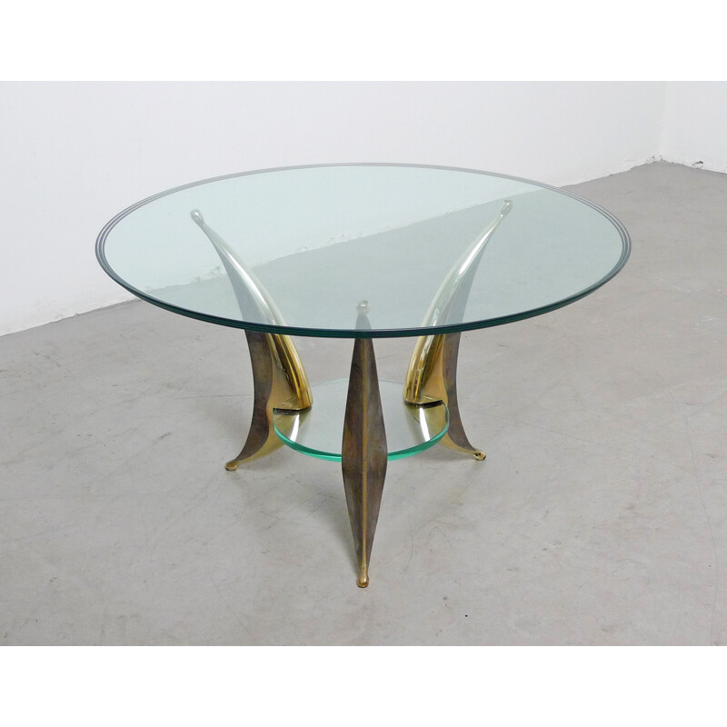 Italian sculptural coffee table with massive brass feet and two glass plates- 1950s