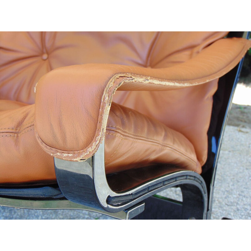 Pair of vintage leather and lacquered wood armchairs by Ingmar Relling