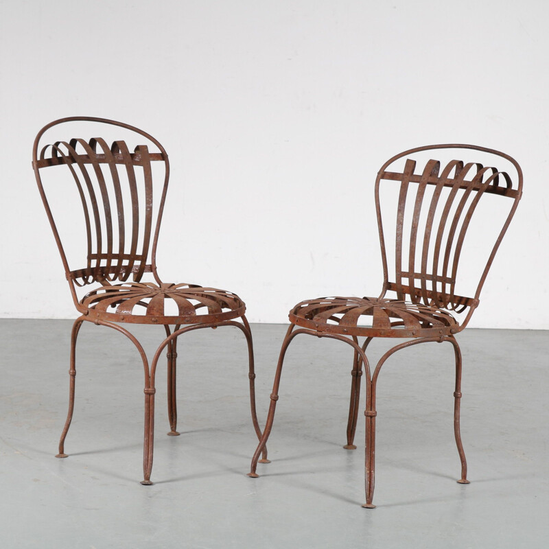 Pair of vintage garden chairs by Francois Carre France 1950s