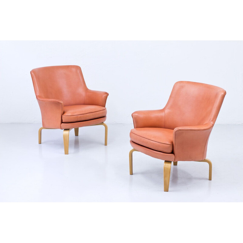 Pair of vintage leather pilot chairs by Arne Norell Sweden 1970s