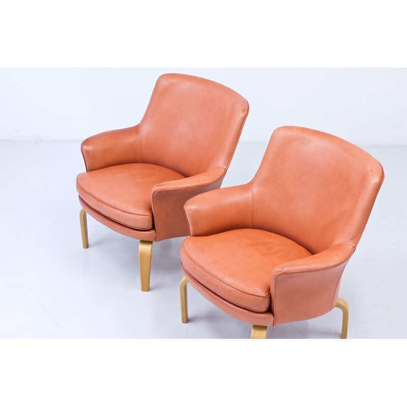 Pair of vintage leather pilot chairs by Arne Norell Sweden 1970s