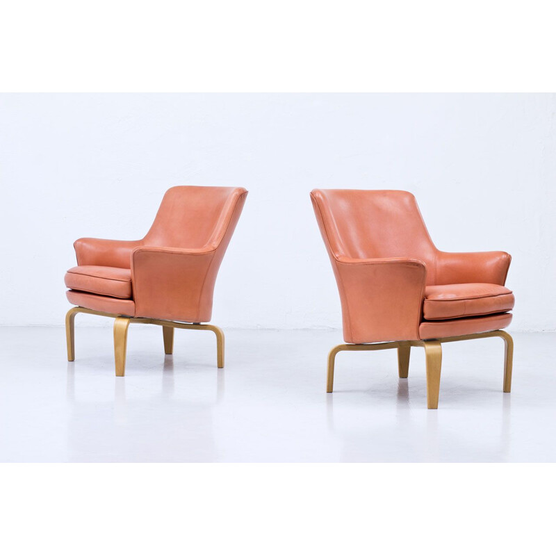 Pair of vintage leather pilot chairs by Arne Norell Sweden 1970s
