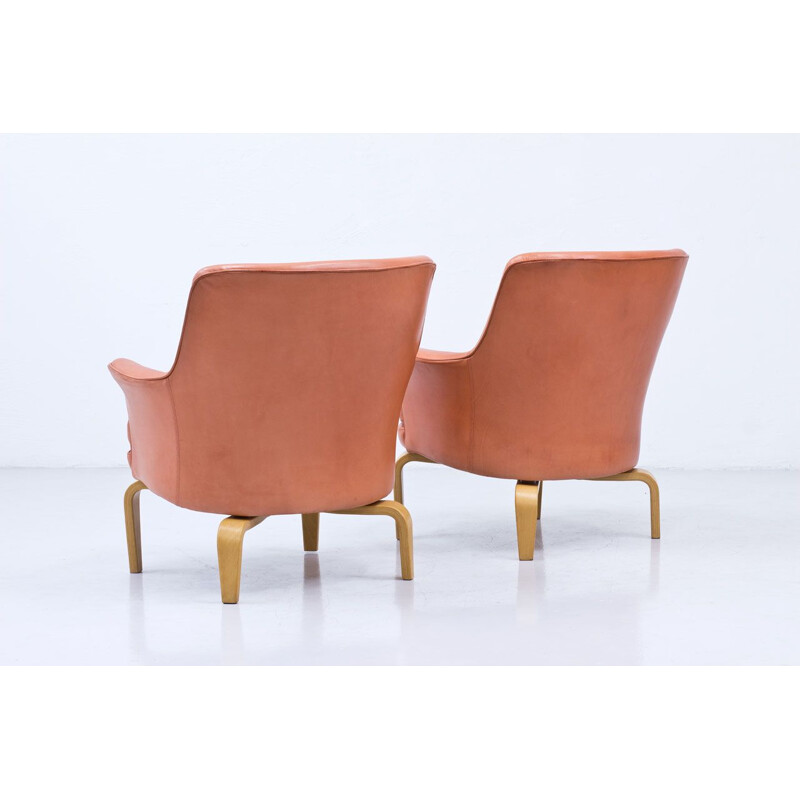 Pair of vintage leather pilot chairs by Arne Norell Sweden 1970s