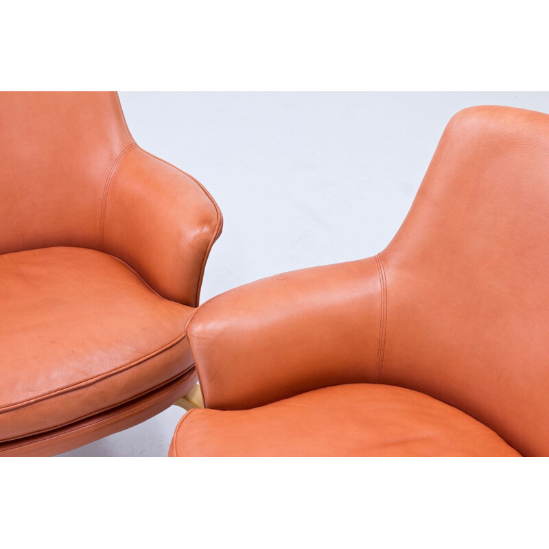 Pair of vintage leather pilot chairs by Arne Norell Sweden 1970s