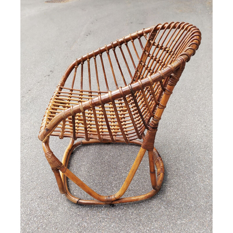 Vintage armchair in rattan by Tito Agnoli for Pierantonio Bonacina 1950