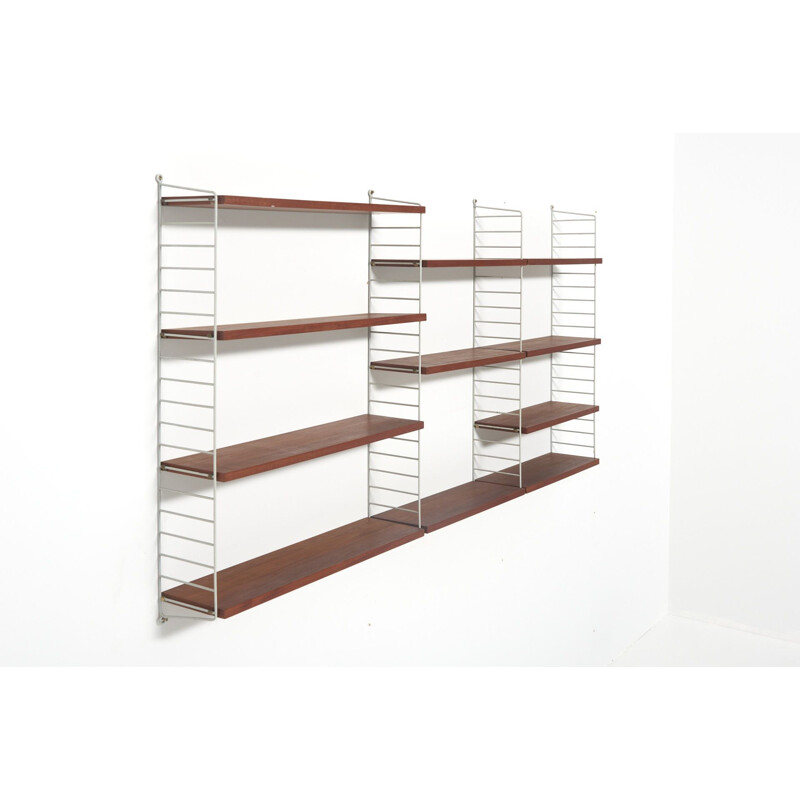 Mid century wall system in teak with 11 shelves By Nisse Strinning for String, Sweden 1950s