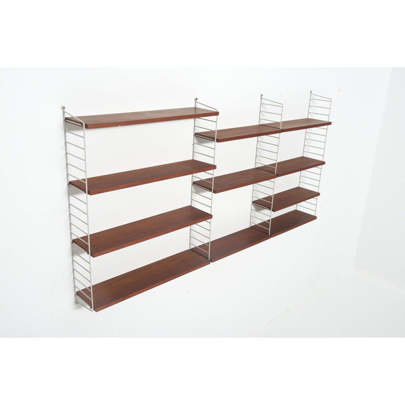 Mid century wall system in teak with 11 shelves By Nisse Strinning for String, Sweden 1950s