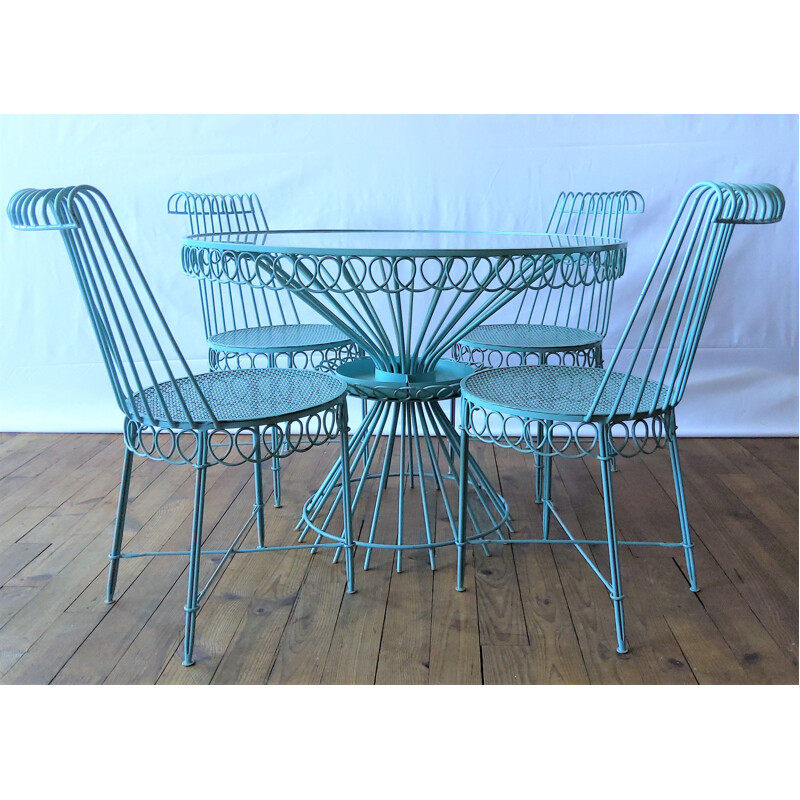 Set of 4 chairs and round vintage glass table Matégot 1950s