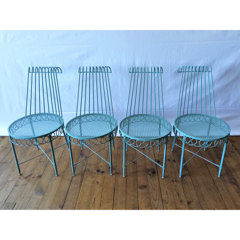 Set of 4 chairs and round vintage glass table Matégot 1950s