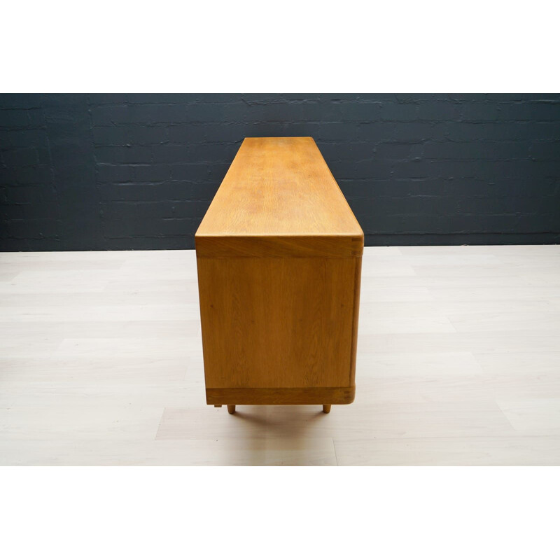 Vintage low sideboard scandinavian oak  by H. W. Klein for Bramin 1960s