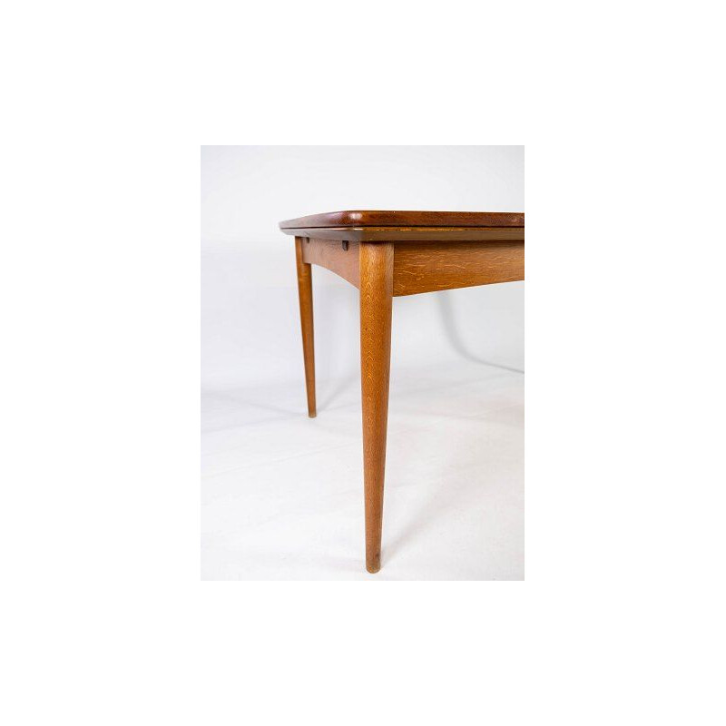 Vintage teak table with extensions and oak legs Denmark 1960s