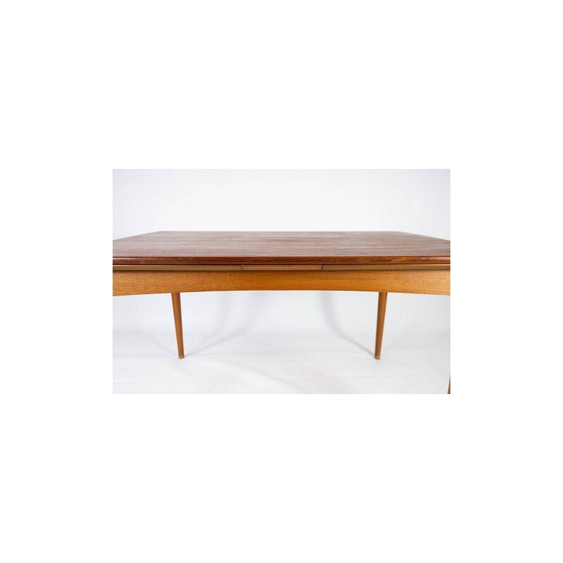 Vintage teak table with extensions and oak legs Denmark 1960s