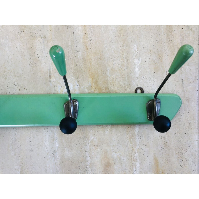 Vintage wall coat rack with 4 almond green wooden hooks 1950s