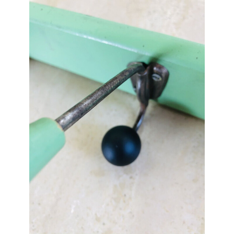 Vintage wall coat rack with 4 almond green wooden hooks 1950s