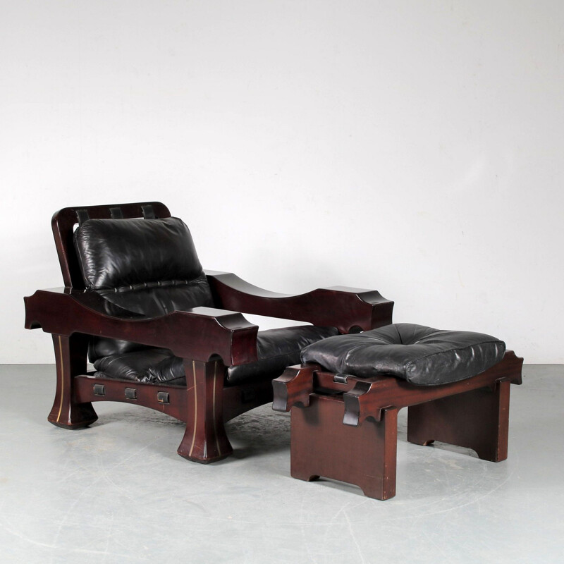 Vintage lounge chair mahogany wood with foot stool by Luciano Frigerio, Italy 1970s