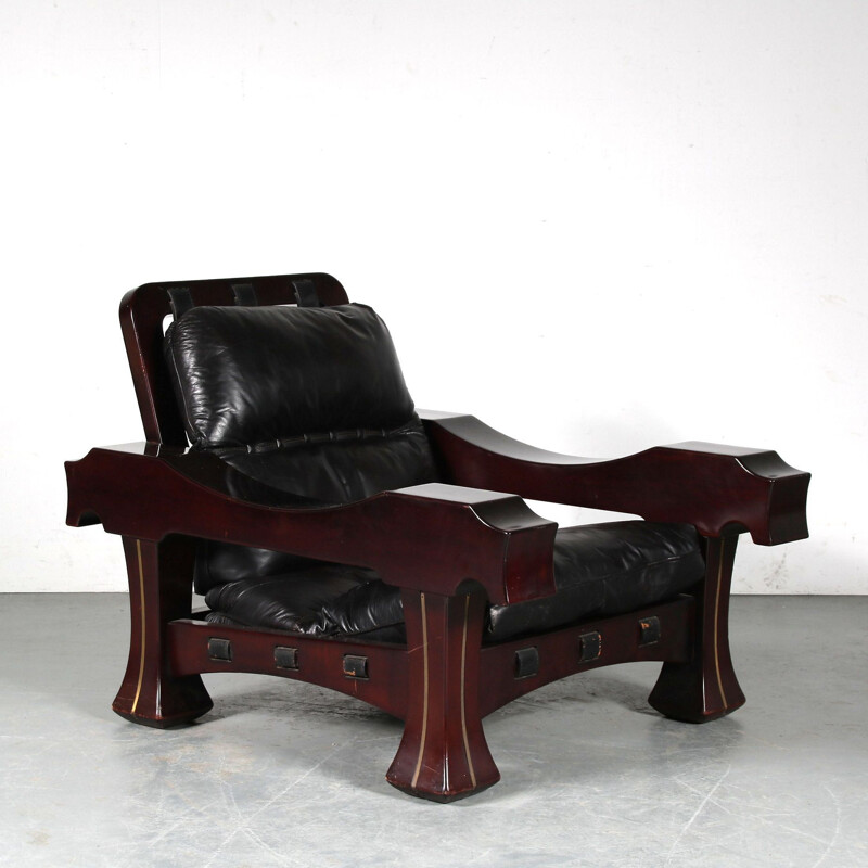 Vintage lounge chair mahogany wood with foot stool by Luciano Frigerio, Italy 1970s
