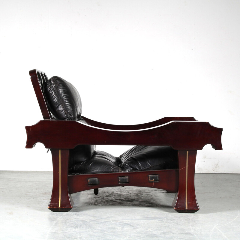 Vintage lounge chair mahogany wood with foot stool by Luciano Frigerio, Italy 1970s