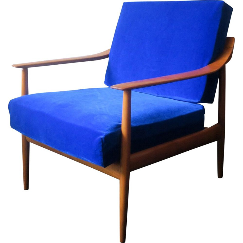 Vintage blue velvet lounge chair with curved back and sprung cushions 1960s