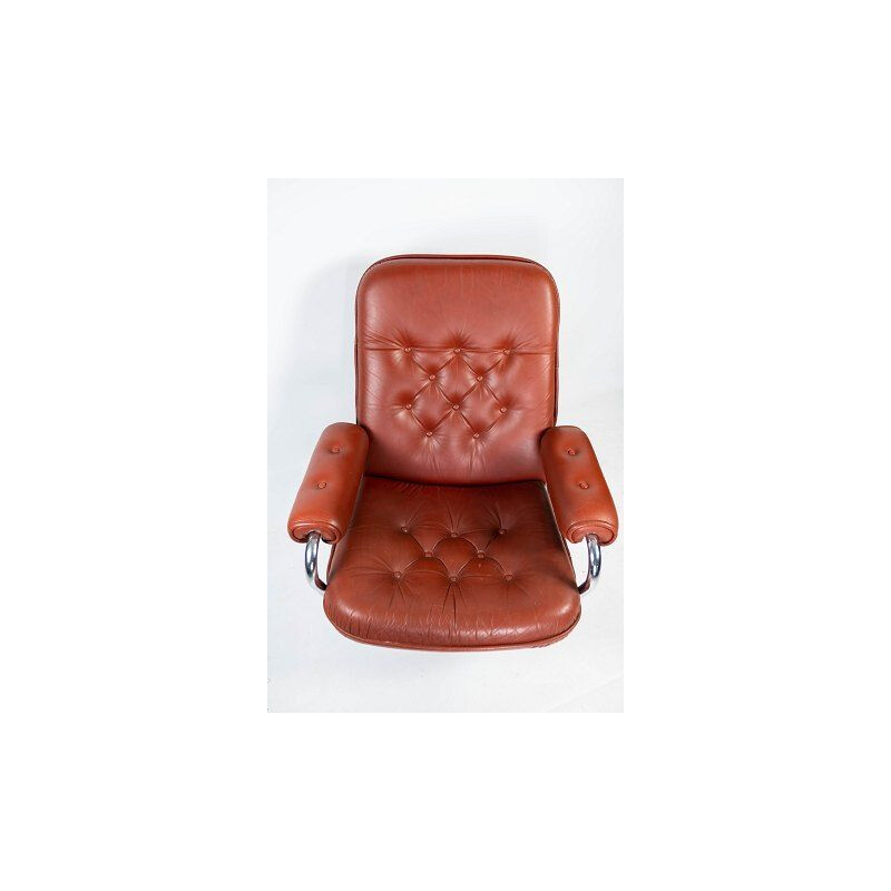 Mid century armchair upholstered with red leather and frame of metal, danish 1960s