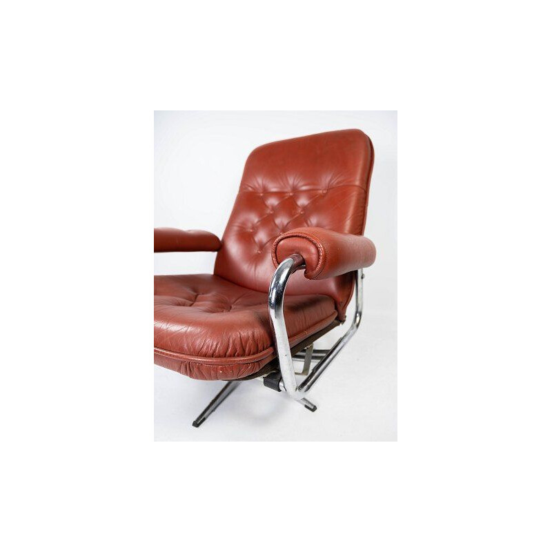 Fauteuil vintage tapissé de cuir rouge et structure en métal, Danemark 1960