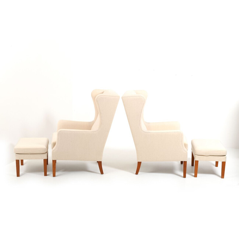 Pair of wingback lounge vintage chairs incl.Ottoman, Danish 1970s