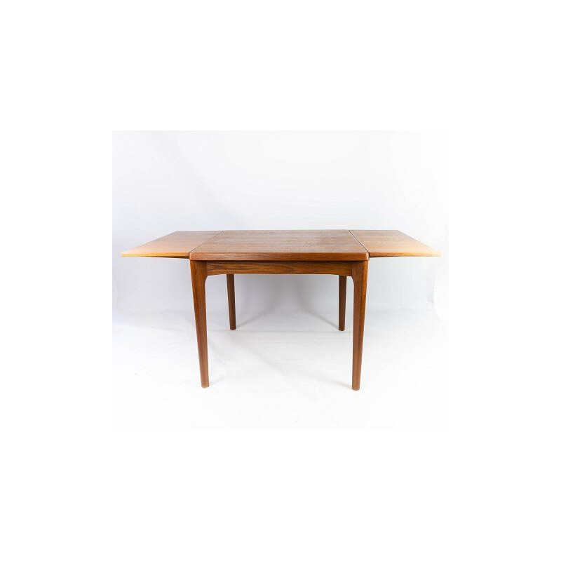 Vintage dining table with extenders in teak by Henning Kjærnulf 1960s