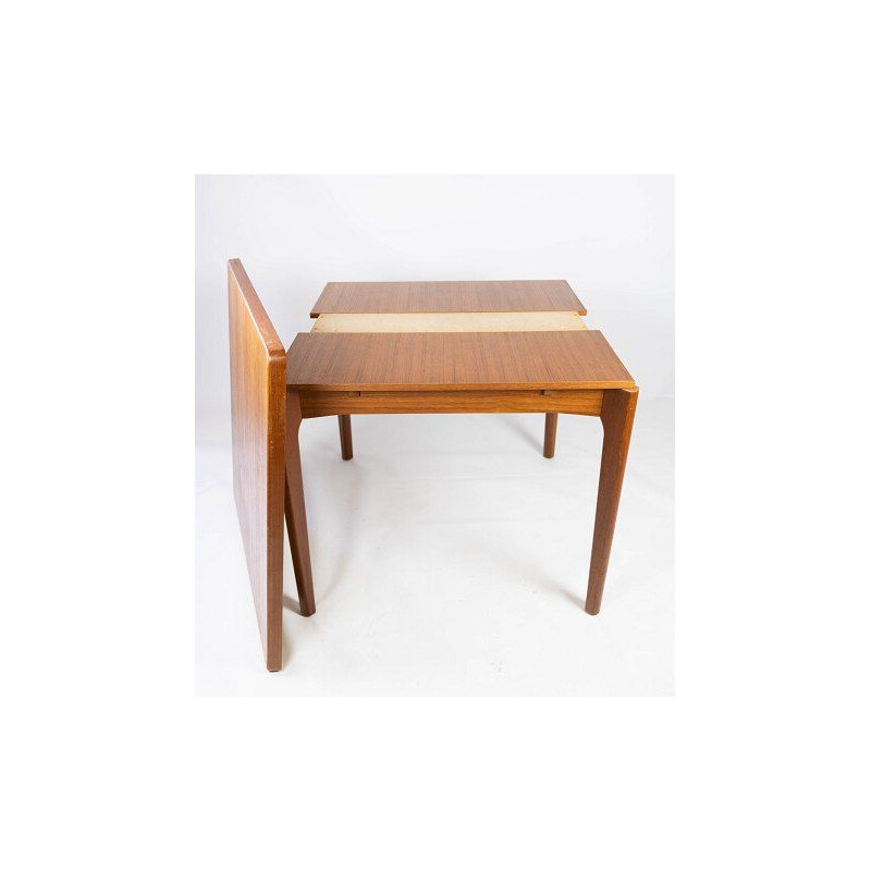 Vintage dining table with extenders in teak by Henning Kjærnulf 1960s