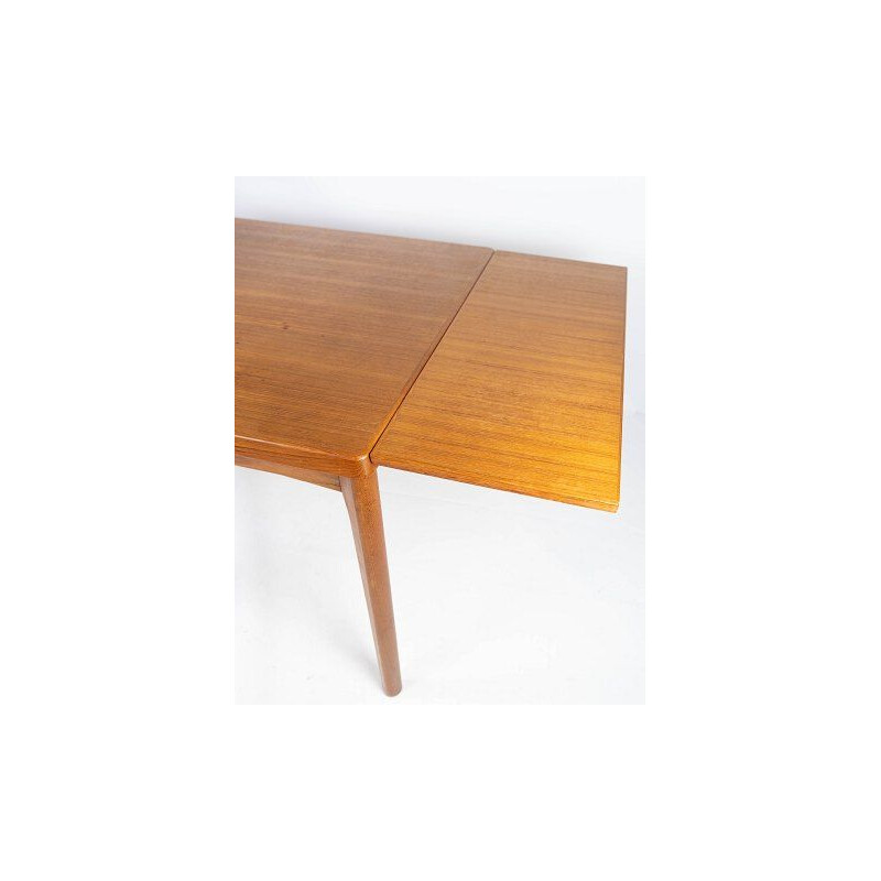 Vintage dining table with extenders in teak by Henning Kjærnulf 1960s