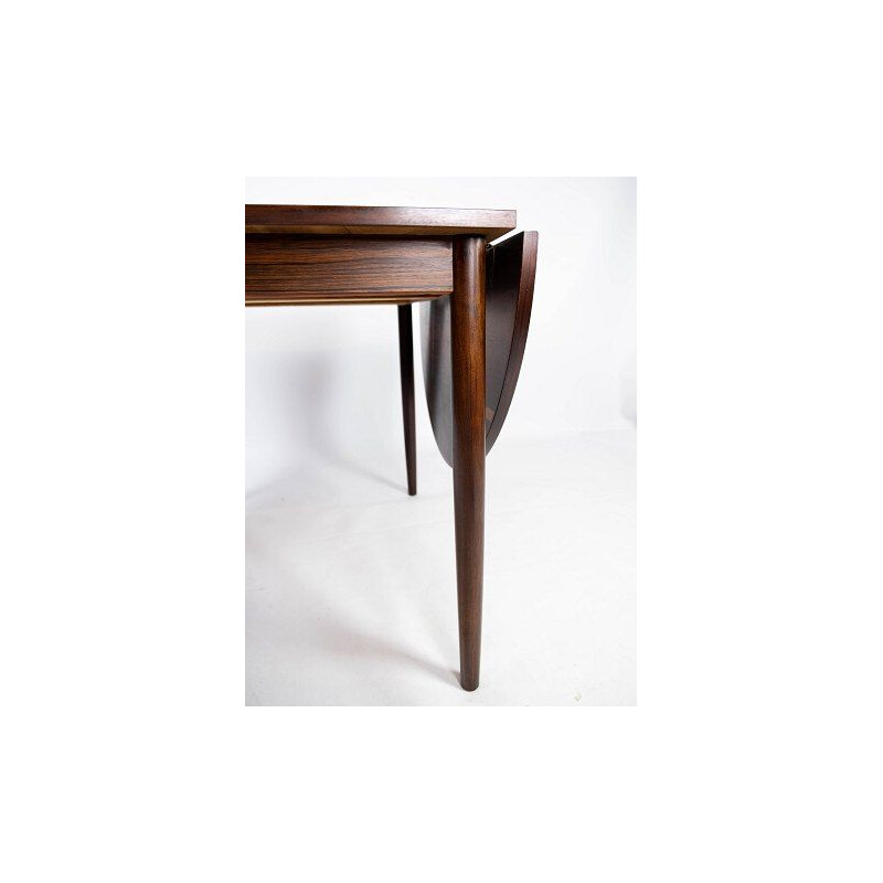 Vintage dining table with extensions in rosewood by Arne Vodder 1960s