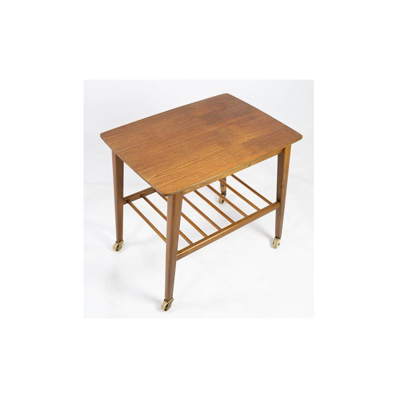 Tavolino vintage con ripiano e rotelle in teak Danimarca 1960