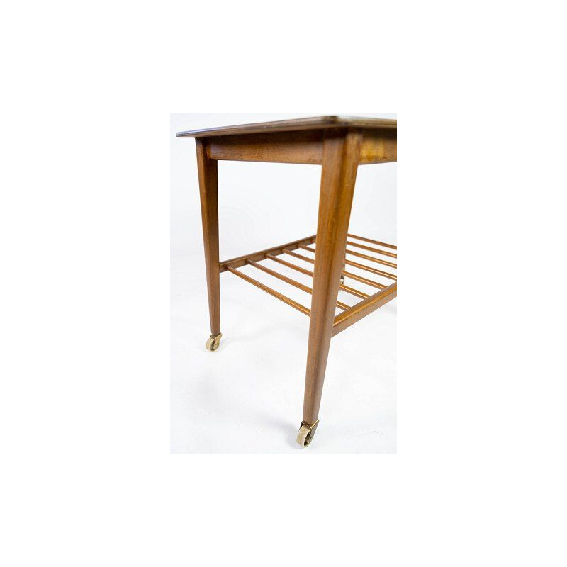 Tavolino vintage con ripiano e rotelle in teak Danimarca 1960