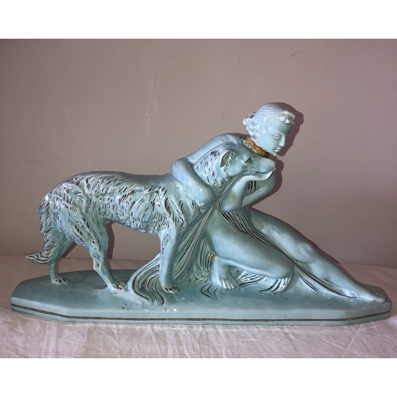 Mid century statue of a woman and a greyhound in glazed earthenware from the Art Deco, 1930s