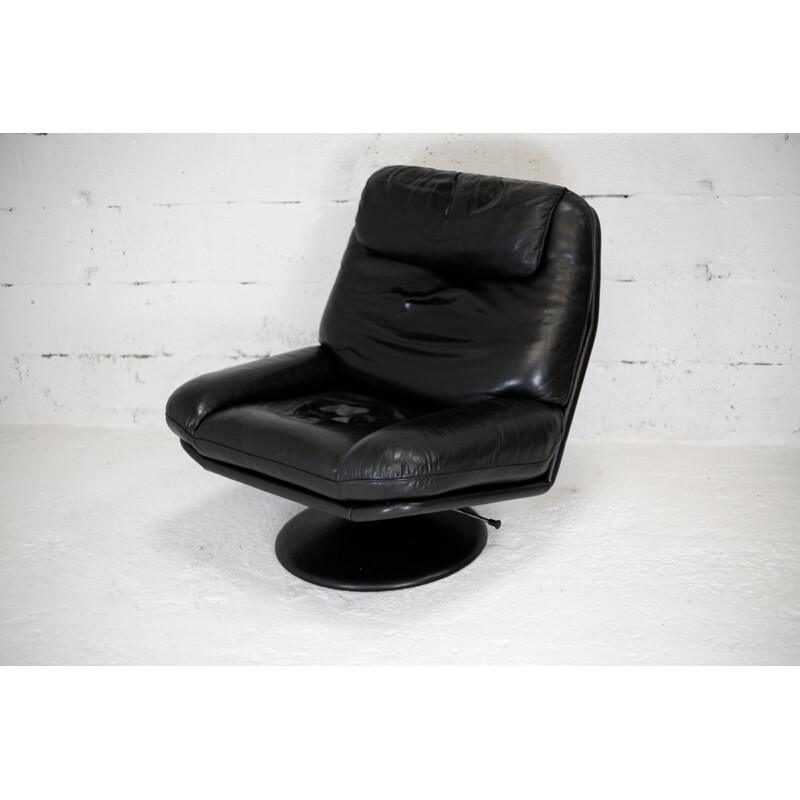 Vintage black leather swivel armchair De Sede suisse circa 1980