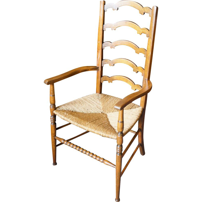 Silla vintage de roble macizo con respaldo de escalera y asiento de junco, Inglaterra 1920