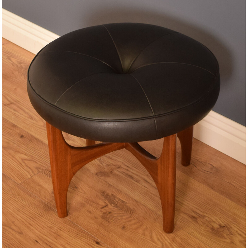 Mid century black leather and teak stool by Victor Wilkins for G Plan 1960s