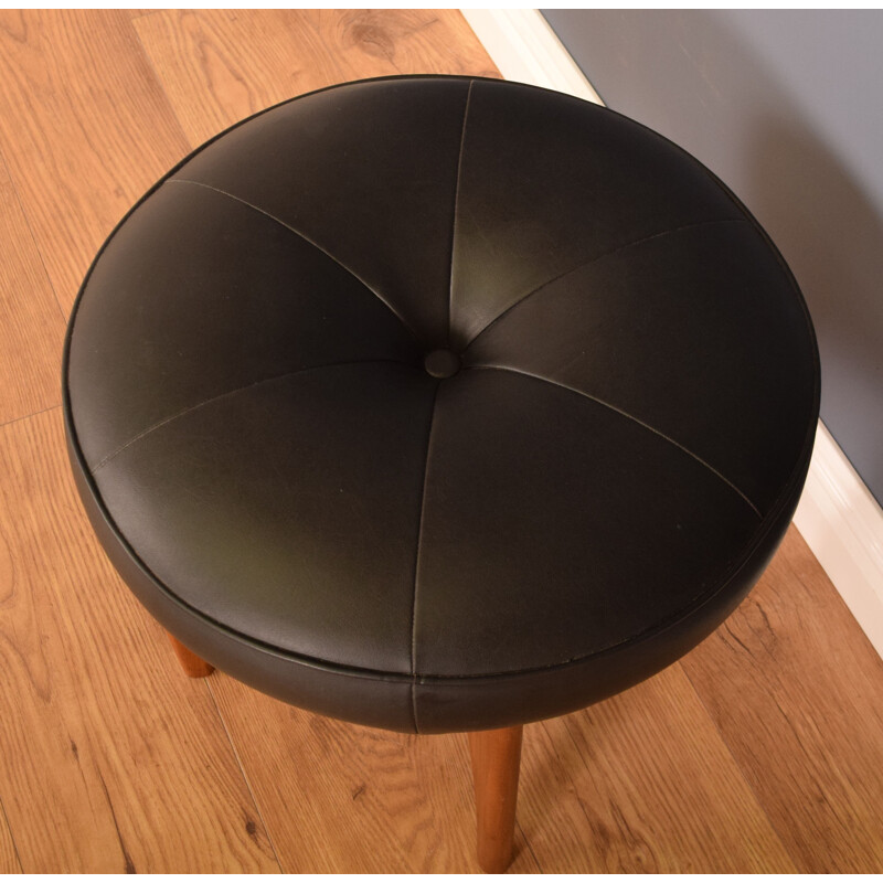 Mid century black leather and teak stool by Victor Wilkins for G Plan 1960s