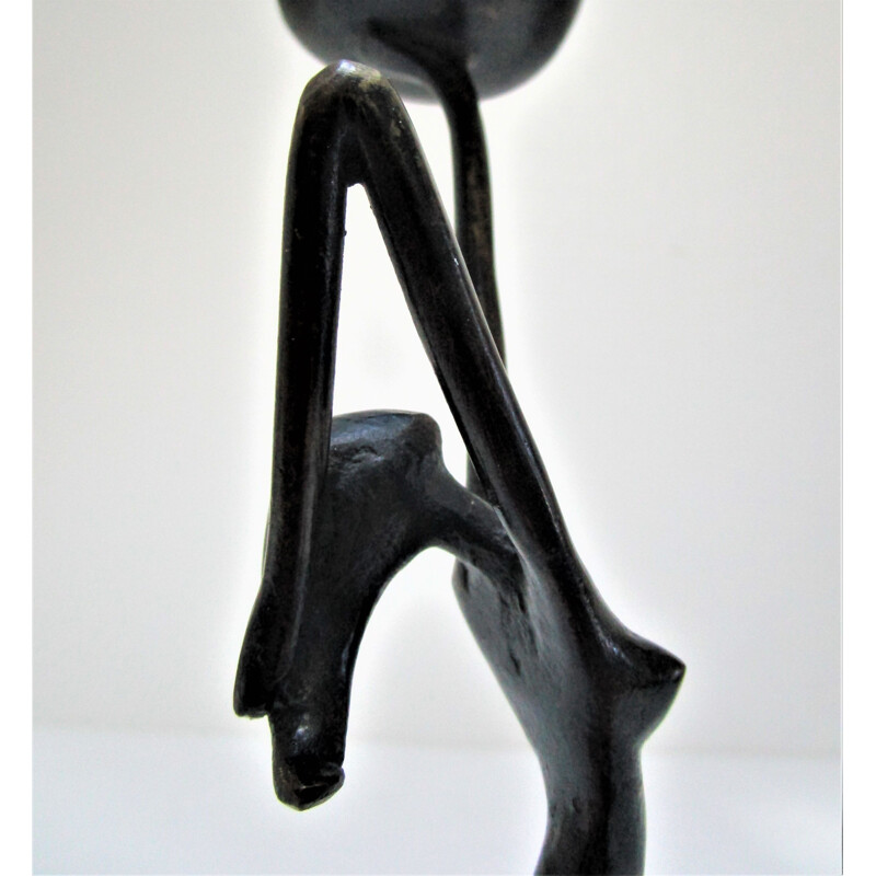 Mid century anthropomorphic candlestick with female figure in blackened bronze, 1970s