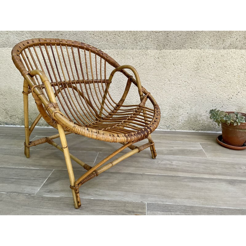Fauteuil coquille vintage Rotin 