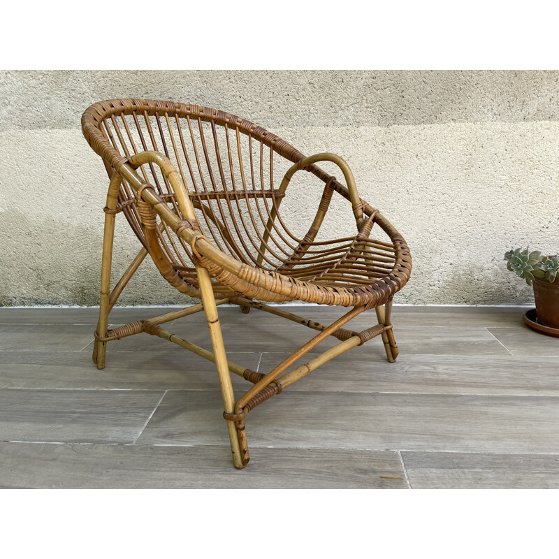 Fauteuil coquille vintage Rotin 