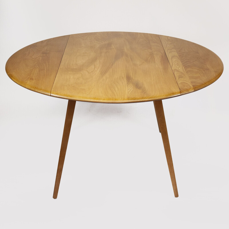 Vintage round drop leaf dining table by Lucian Ercolani for Ercol, 1960s