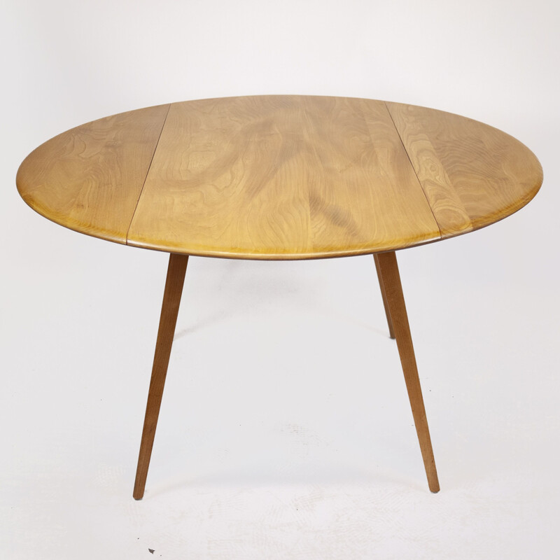 Vintage round drop leaf dining table by Lucian Ercolani for Ercol, 1960s