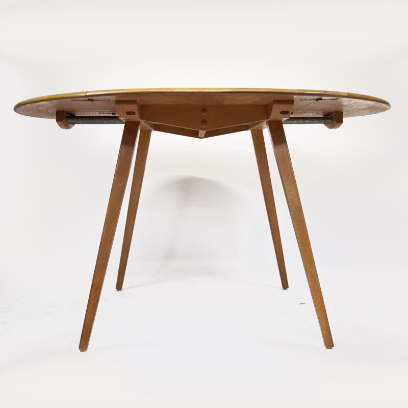 Vintage round drop leaf dining table by Lucian Ercolani for Ercol, 1960s