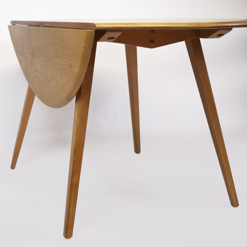 Vintage round drop leaf dining table by Lucian Ercolani for Ercol, 1960s