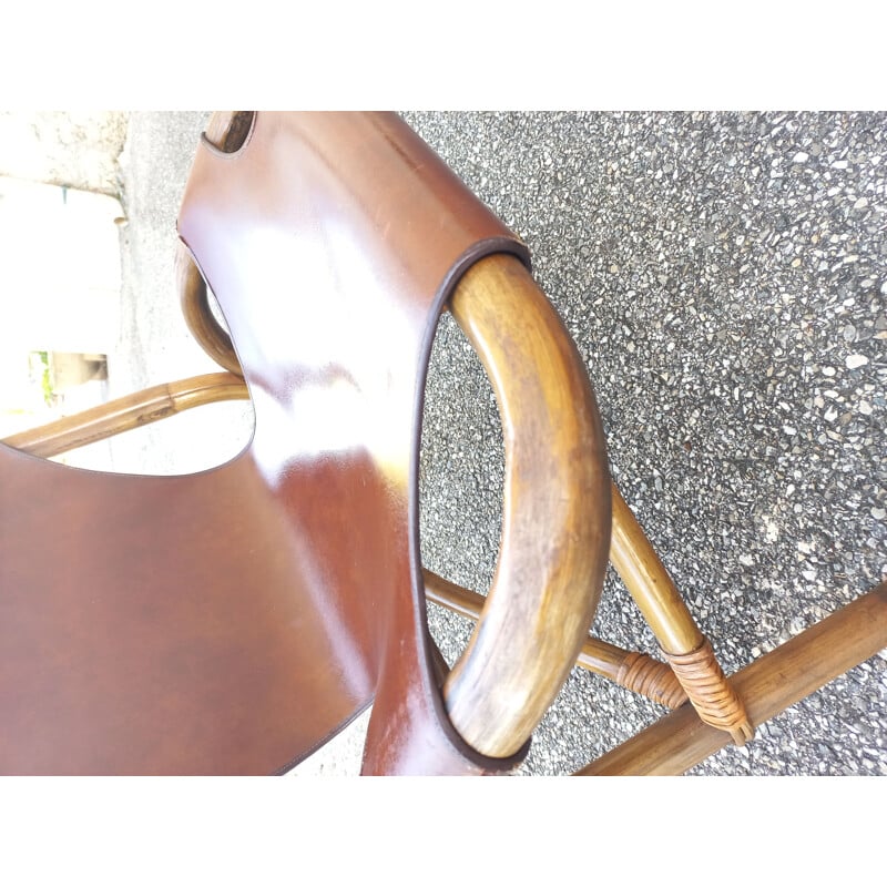 Paire de fauteuils vintage en rotin et simili cuir