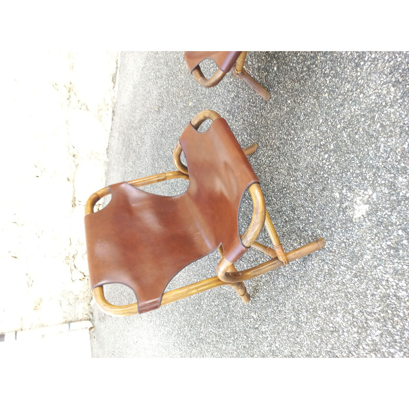 Pair of vintage armchairs in rattan and imitation leather