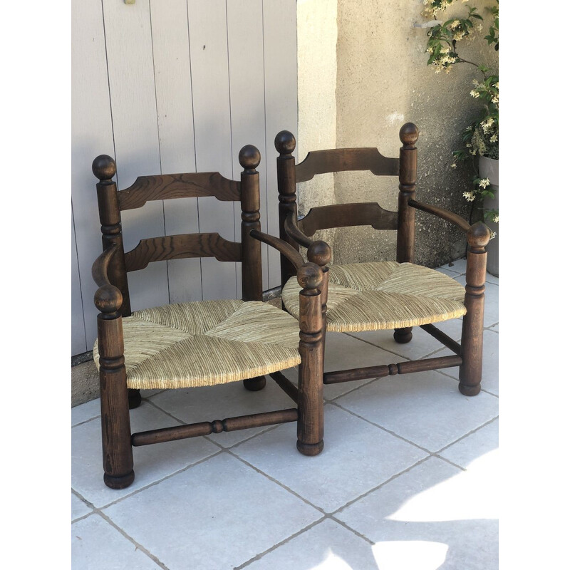 Pair of vintage oak and straw armchairs by Charles Dudouyt,1940s