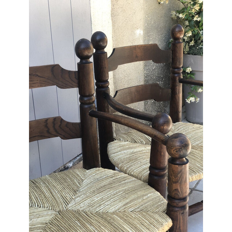 Pair of vintage oak and straw armchairs by Charles Dudouyt,1940s