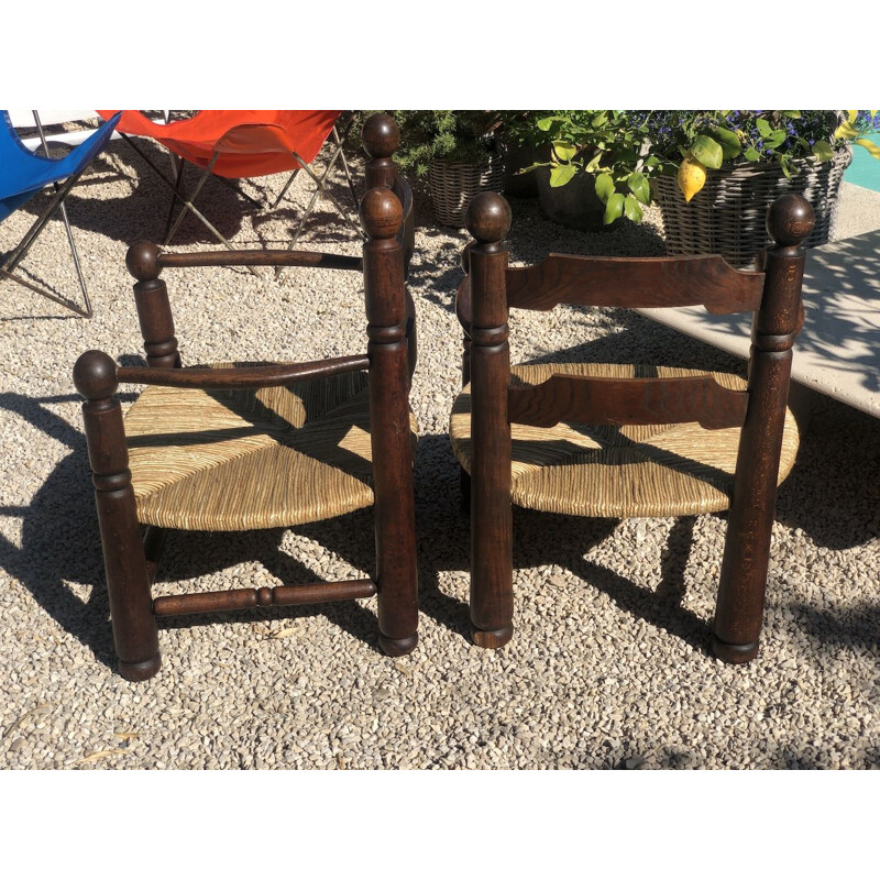 Pair of vintage oak and straw armchairs by Charles Dudouyt,1940s